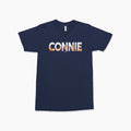Navy blue short-sleeve tee with large white and orange gradient "CONNIE" text across the chest.